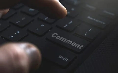 Comment button on keyboard. Write comments online Stock Photos