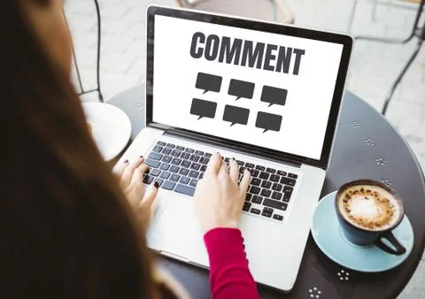 Comment text and chat graphic on laptop screen with womans hands Stock Photos