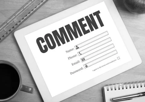 Comment text and graphic on tablet screen Foto stock