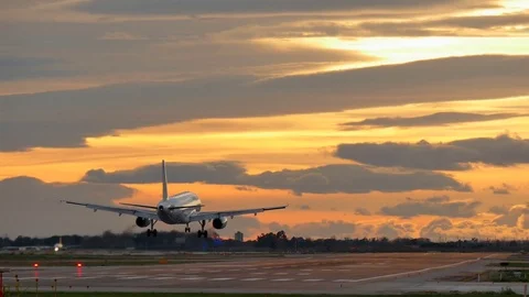 Commercial Aircraft Landing at Barcelona Airport at Sunset Stock Footage 80510416
