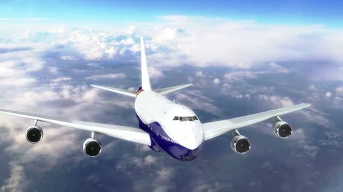 Commercial airplane flying above the clouds Stock Footage