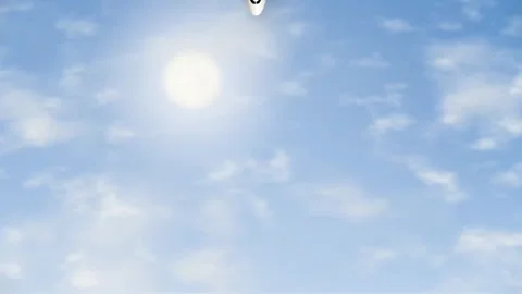 Commercial Airplane Flying Downward Through Sunny Blue Sky with Clouds Stock Footage 345708019