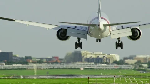 Commercial airplane is landing at Hamburg Airport Stock Footage