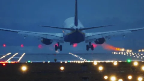 Commercial Airplane Landing at Night Stock Footage