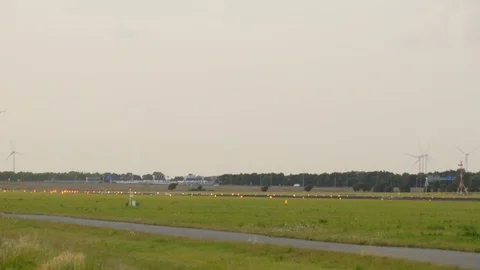 Commercial airplane transporting passengers landing at Schiphol airport Stock-Footage 113975053