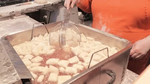 Commercial Bakery. The process of roast sweet biscuits Stock Footage 83765703