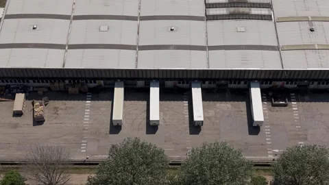 Commercial Beverage Manufacturing Site, Loading Dock Drone View Italy Stock Footage 335998312