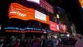 Commercial billboards and crowd on Times Square New York City at night 4k or 4k+ Resolution