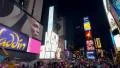 Commercial billboards and crowds on Times Square New York City at night 4k or 4k+ Resolution