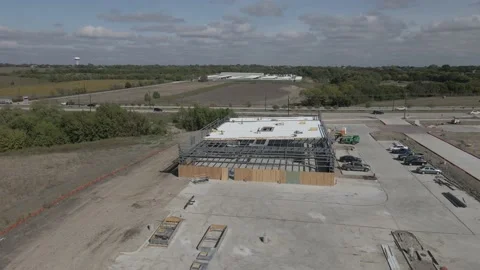 Commercial building construction (high pan) Stock-Footage 165961892