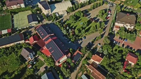 Commercial building roofing lined with large solar panel arrays in Romania 스톡 동영상 295933045
