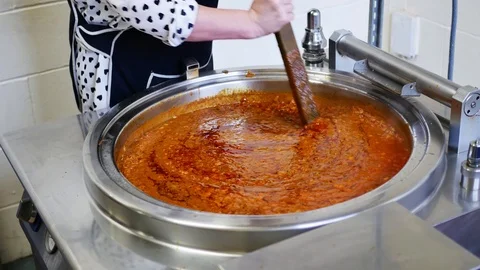 Commercial cooking pan with a batch of sauce Stock Footage 113134025