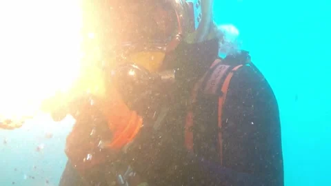 Commercial diver cutting a pipeline using an ultrathermic torch. Dangerous Job. Stock Footage 210539285