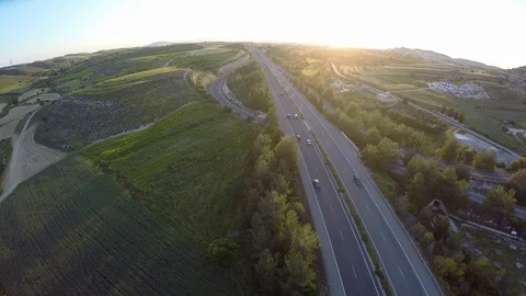 Commercial drone flying over fields, monitoring state of farmland before harvest Stock Footage