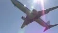 Commercial jet flies overhead HD Footage