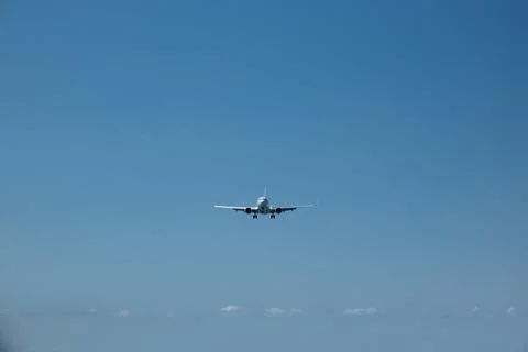 Commercial Jet Plane in Front View During Landing Approach Stock Photos