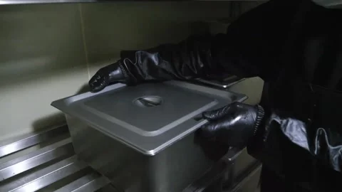 Commercial Kitchen Worker Placing Stainless Steel Hotel Pan on Storage Rack Video stock 343028501