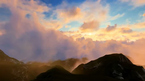 Commercial plane coming out of the clouds at sunset Stock Footage 172292168