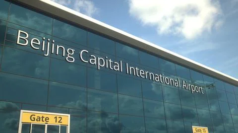 Commercial plane take off reflecting in the windows with Beijing Capital Ilustración de archivo