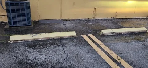 Commercial square AC unit installed outside office and retail building Stock Footage 327067278