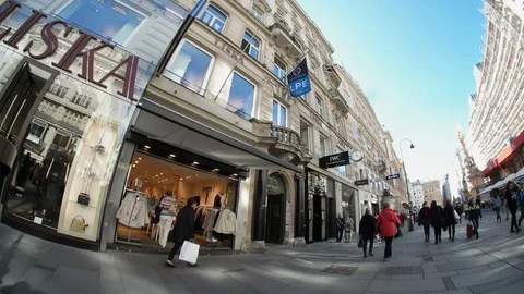 Commercial street with shops for tourists in Vienna, Austria in a sunny day Stock Footage