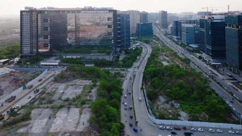 Commerzone building with knowledge city, road, traffic flow and high rise Stock Footage 344285613