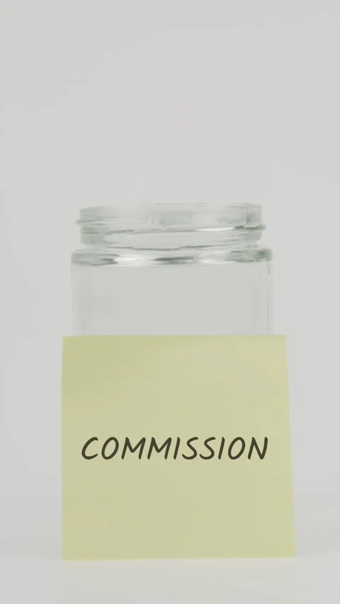Commission text or word on yellow sticky note attached to glass jar with Stock Footage 311694460