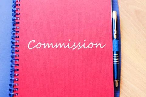 Commission write on notebook Stock Photos