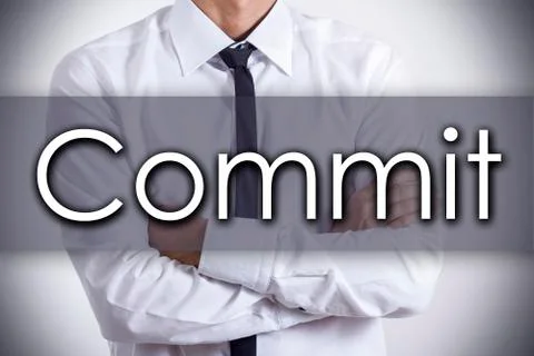 Commit - Young businessman with text - business concept Foto stock