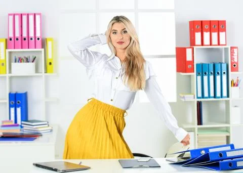 Commitment. Attractive student in modern office. entrepreneur with laptop write Foto stock