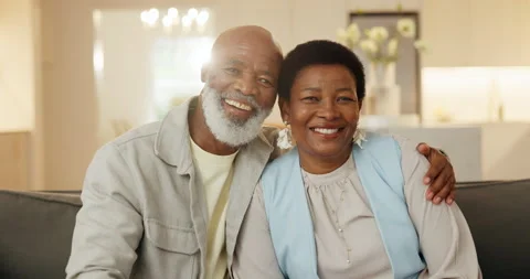 Commitment, love and face of black couple on sofa of home for bonding, support Stock Footage 337541460