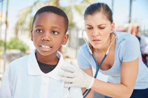 Committed to improving health in the developing world. a volunteer nurse Foto stock