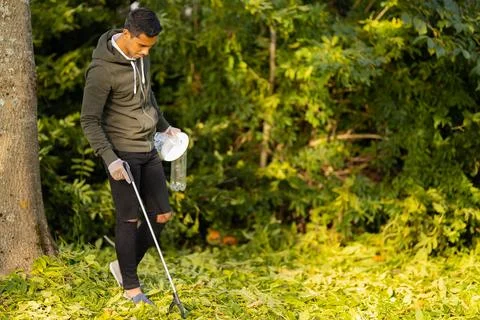 Committed volunteer conserving environment from pollution and plastic Stock Photos