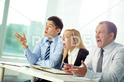 Committee of three people shouting at a speaker Stock Photos