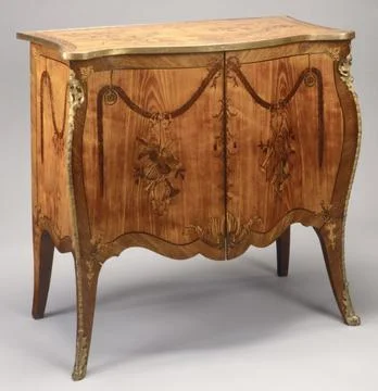 Commode ca. 176570 British This commode in the French taste belongs to a gr.. Stock Photos