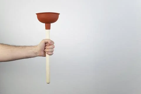 Common drain issues, hand hold plunger, plumbing sewer pipe Stock Photos