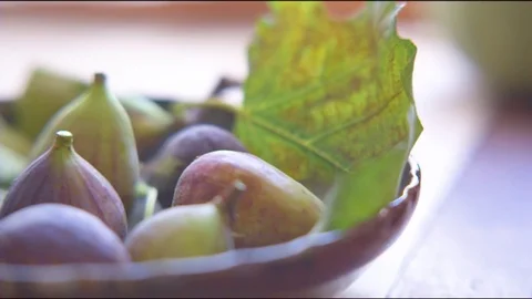 Common figs on dish Stock-Footage 76136257