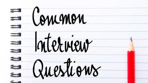 Common Interview Questions written on notebook Stock Photos