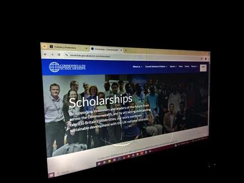 Commonwealth Scholarship website user interface opened on PC. Fotos de archivo