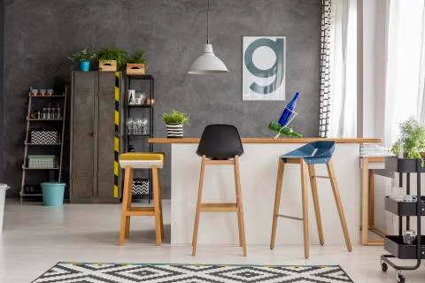 Communal table in dining room 스톡 사진