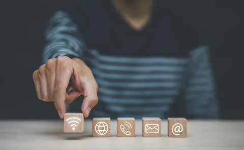 Communication and technology concept , Hand putting wooden block cube symbol  Foto stock