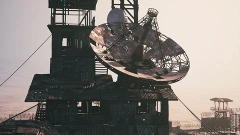 Communication array atop a dilapidated structure in a remote location Stock Footage 331422459