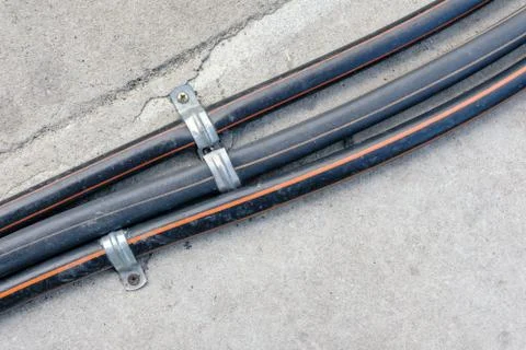 Communication cables on ground Stock Photos