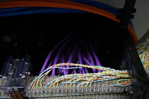 Communication cables in a patch panel Stock Photos