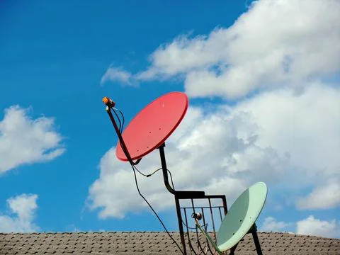 Communication concept with Satellite dish on cloud background Stock Photos