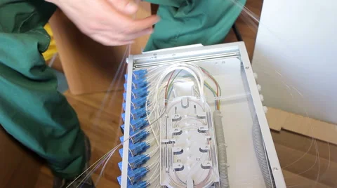 Communication Engineer working with optical fibers Stock Footage 65397314