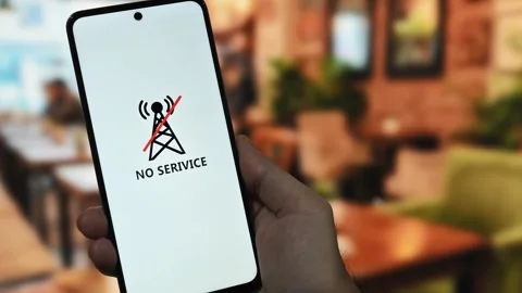 Communication issues concept with a smartphone displaying a no service error Stock Footage 340510029