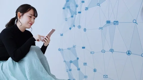 Communication network concept. Young asian woman using a smart phone. Stock Footage 122619607