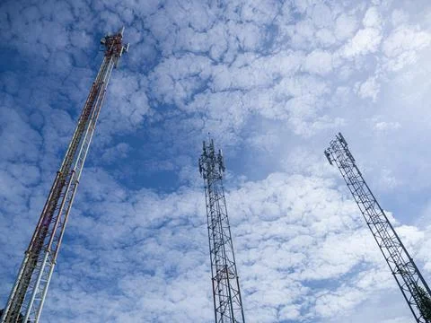 Communication pole with blue sky background Stock Photos