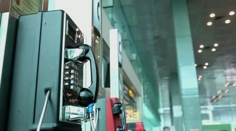 Communication by public phone Stock Footage 14590742